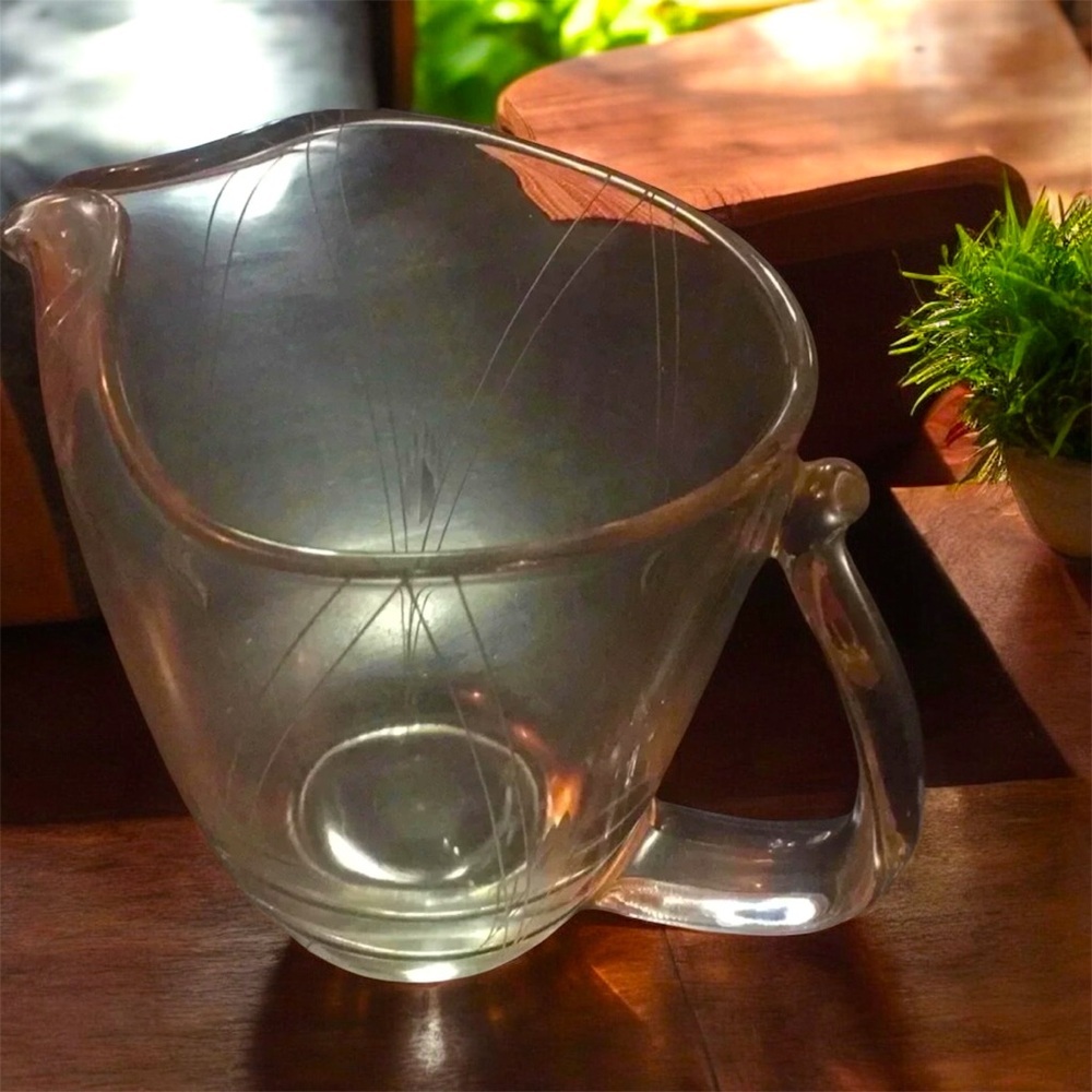 Pitcher-etched glass